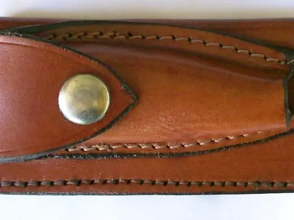 Brown leather case with stitching