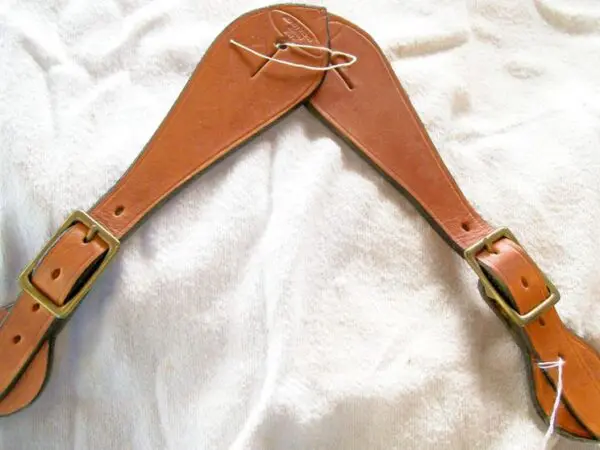 Leather straps on white background