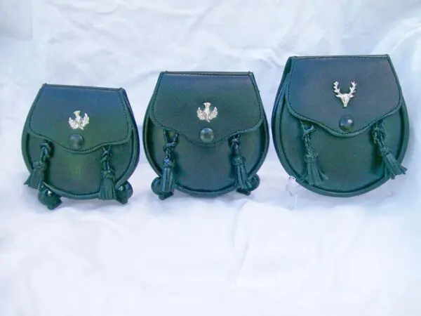 Black sporrans with silver emblem detailing
