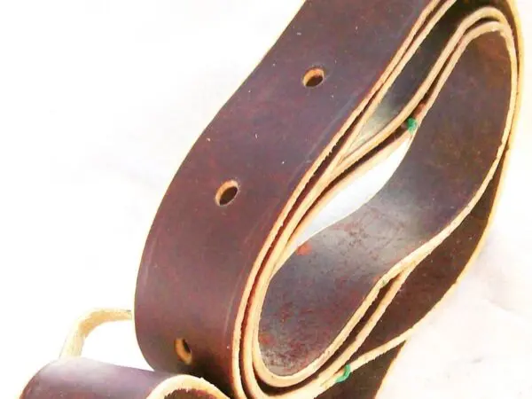 Rolled belt on white background