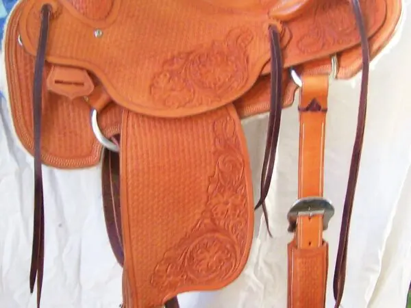 Ornate leather saddle with intricate patterns