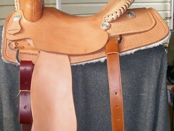 Leather horse saddle on display