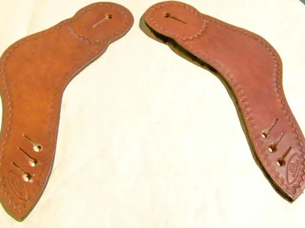 Brown leather insoles with stitching detail