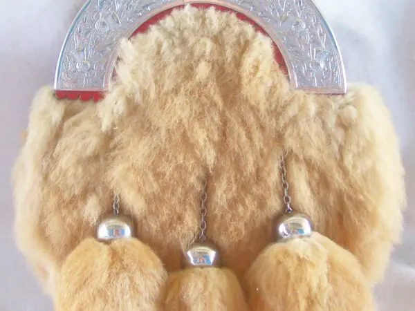 Traditional fur sporran with metal accents