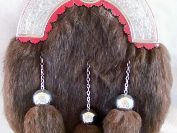 Decorative fur piece with hanging ornaments