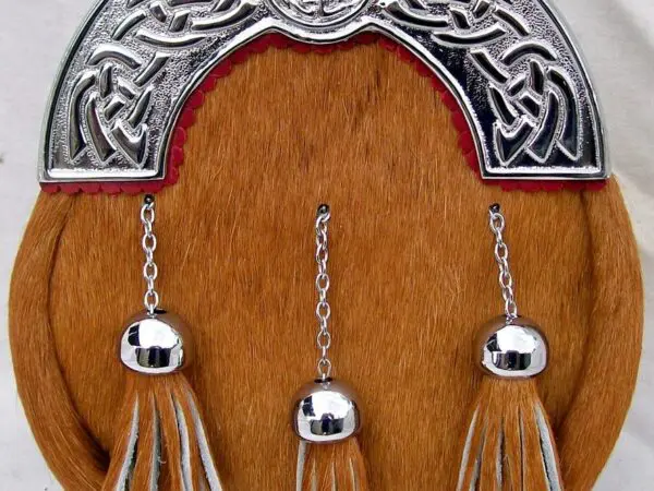 Traditional sporran featuring tassels and Celtic design
