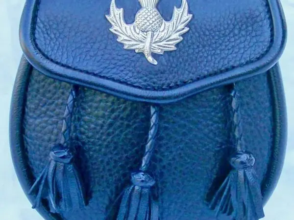 Black sporran with silver thistle emblem