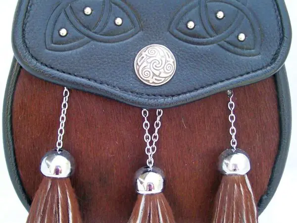 Leather pouch with tassels and Celtic design