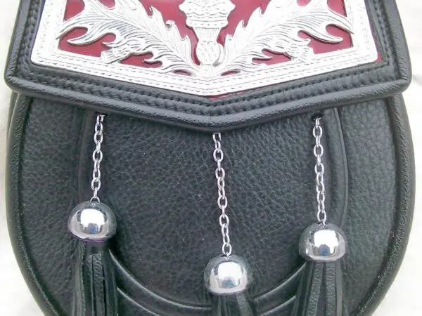 Black leather sporran with silver tassels