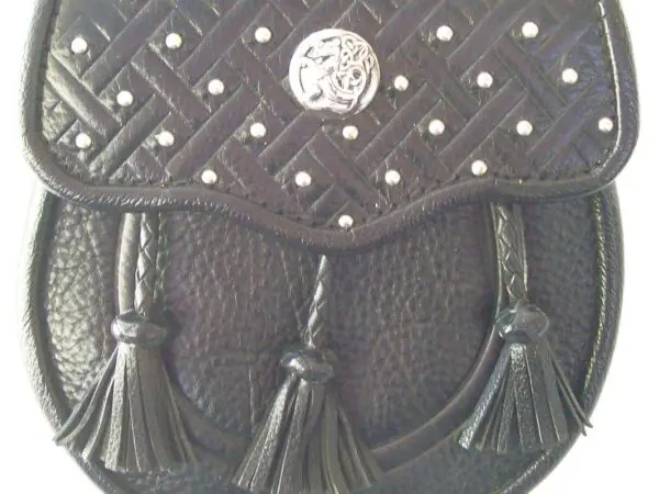 Traditional Scottish sporran with tassel accents