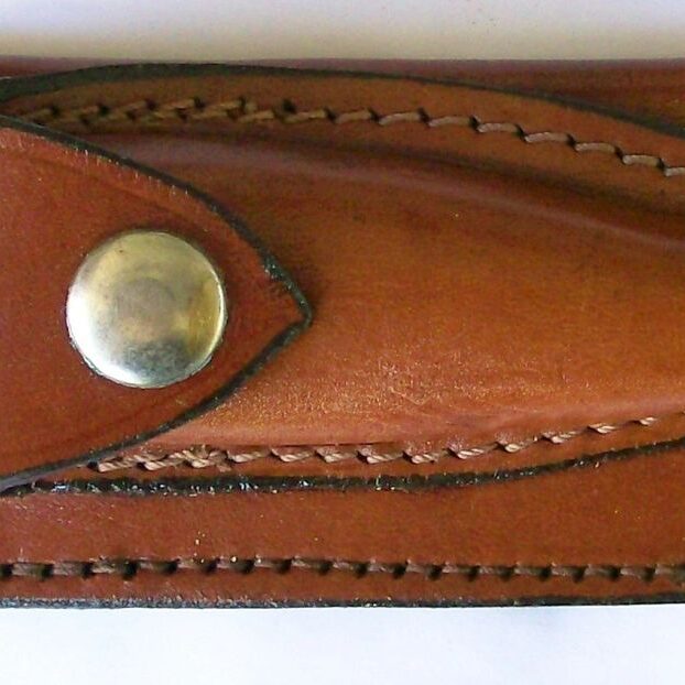 Brown leather case with stitching