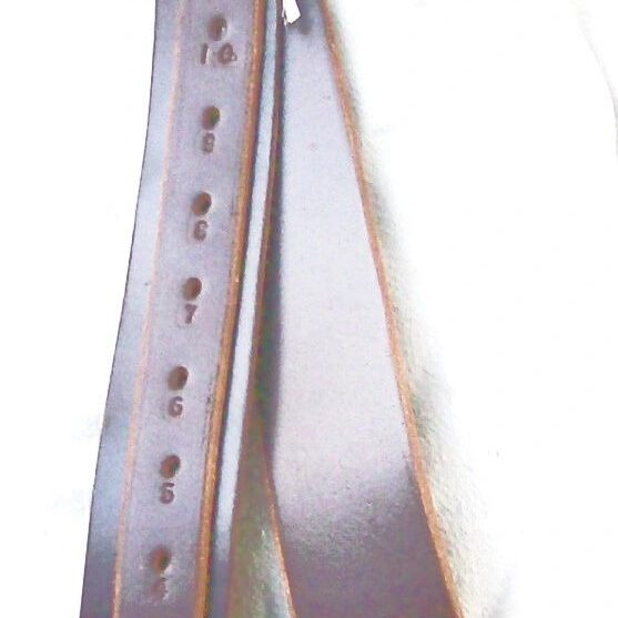 Long leather strap with holes and buckles