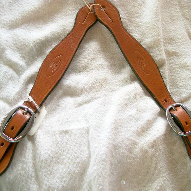 Brown leather straps on display