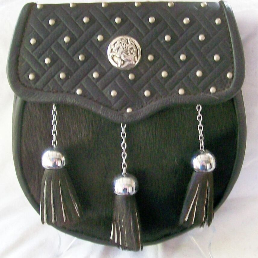 Decorative purse featuring metal embellishments