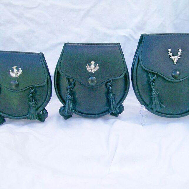 Black sporrans with silver emblem detailing