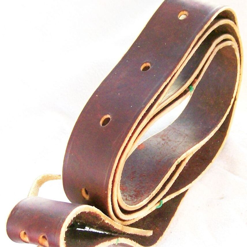 Rolled belt on white background