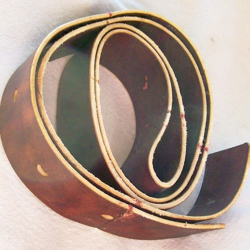 Coiled brown leather strap