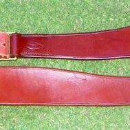 Brown leather straps with buckles