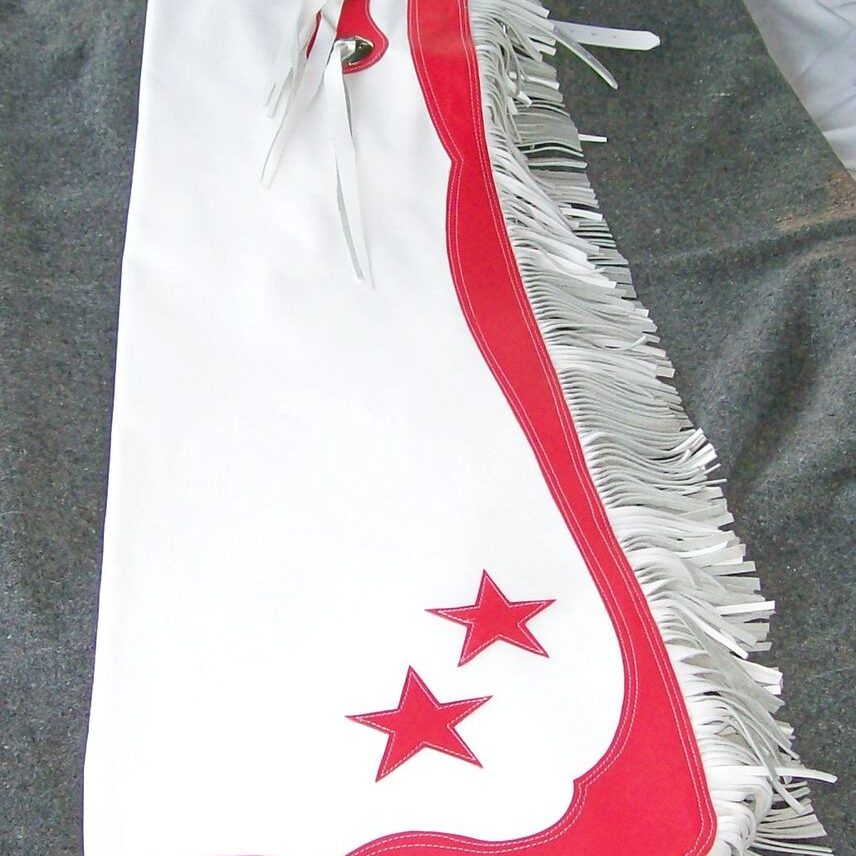 White and red fringed chaps with stars