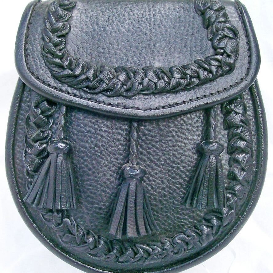Decorative leather pouch with tassels
