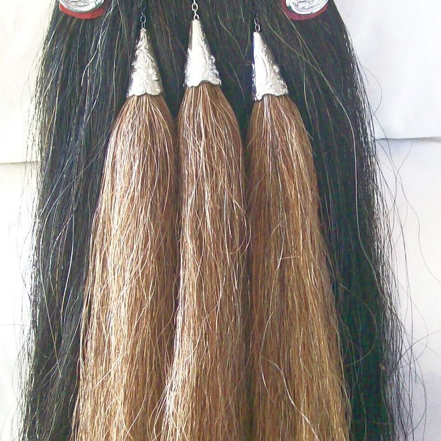 Decorative horsehair tassels with ornate top