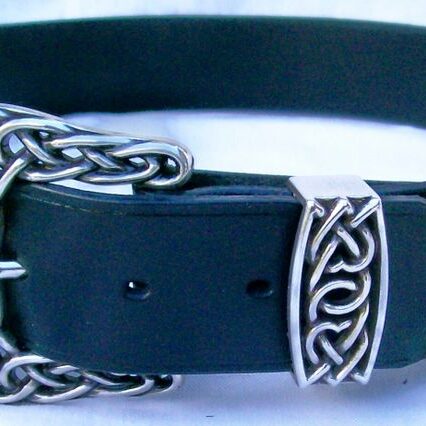 Ornate Celtic buckle on leather belt