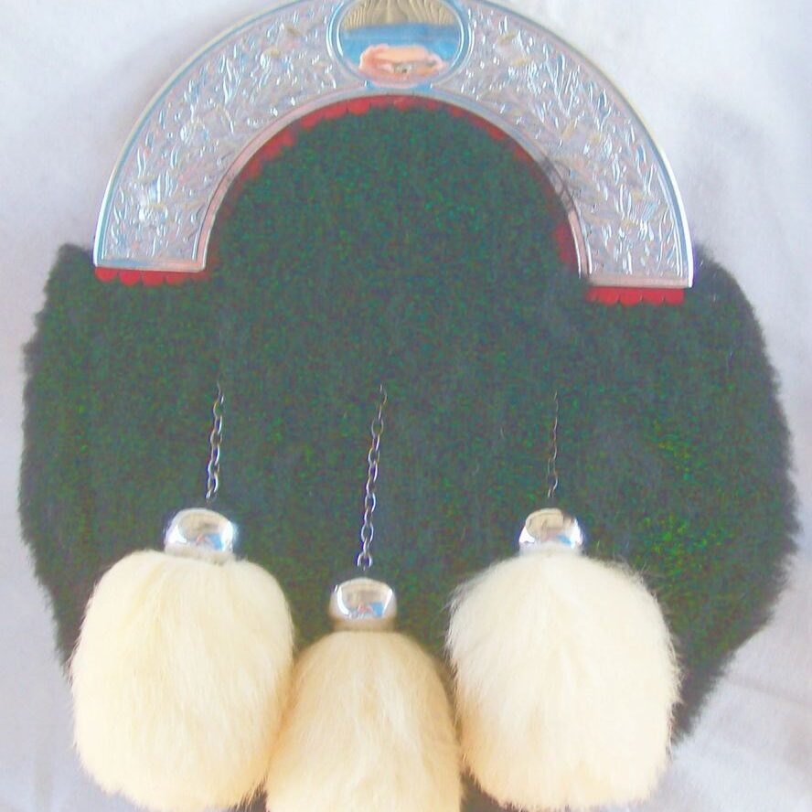 Ornate sporran featuring three tassels
