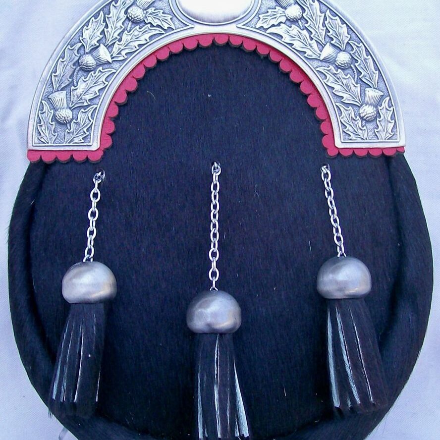 Black sporran with silver tassels