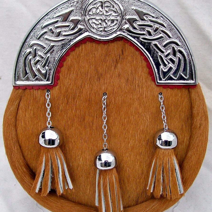 Traditional sporran featuring tassels and Celtic design
